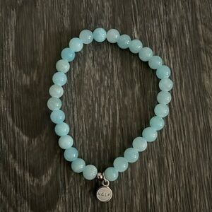 Elegant Blue Beaded Bracelet with Silver Charm